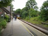 June 2002. Baildon Station. Shows that it has been electrified and also shows the overgrown platform on the other side.